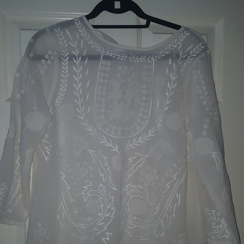 white sheer embroidered blouse